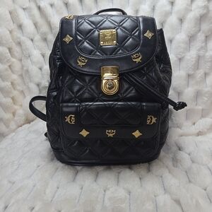 MCM Black Quilted Backpack with Gold Accents